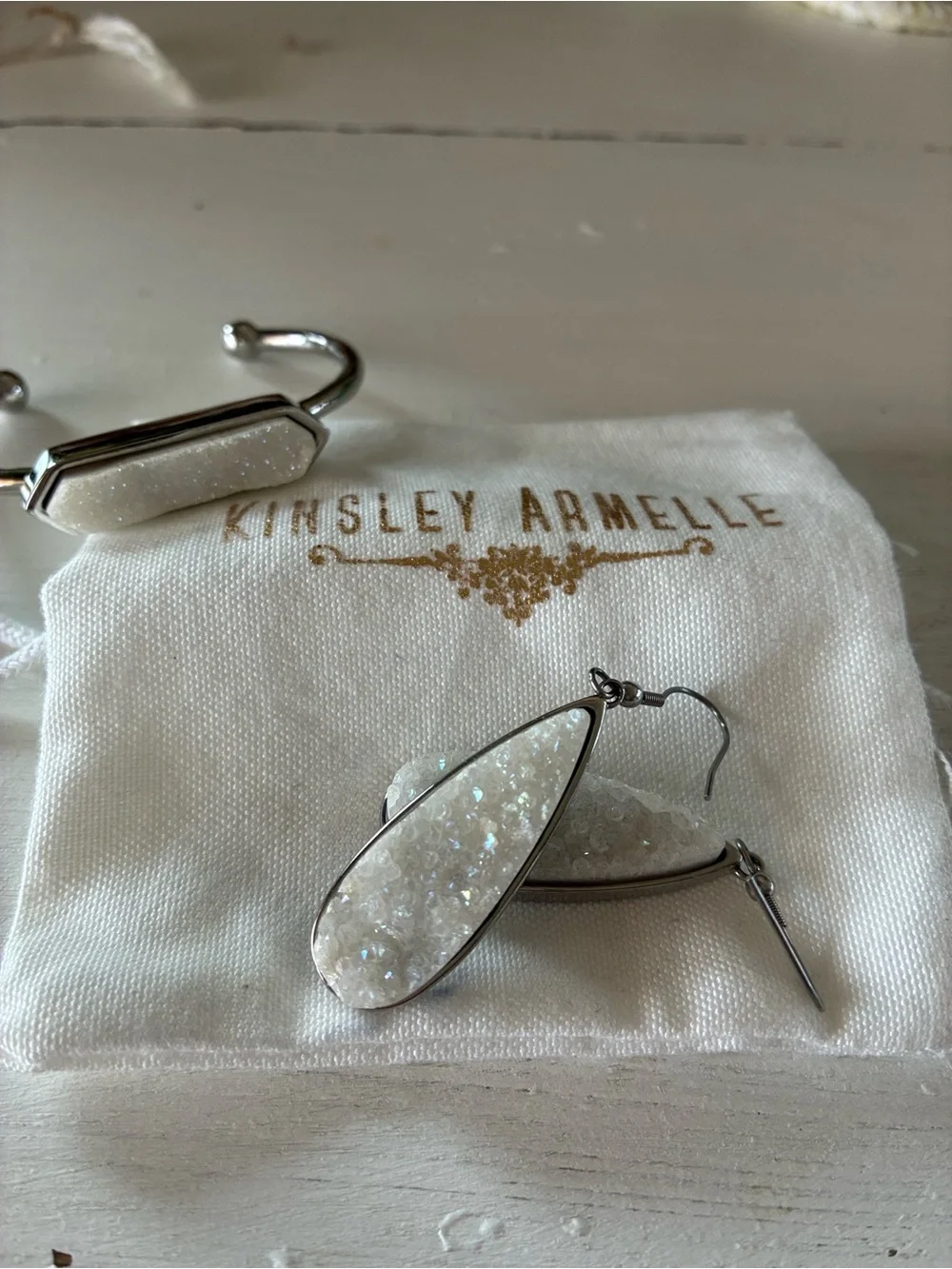 Kinsley Armelle White Druzy Teardrop Earrings and matching silver tone bracelet